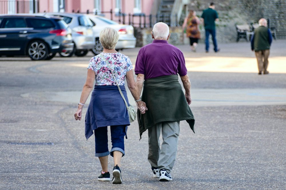 A couple walking, hands held